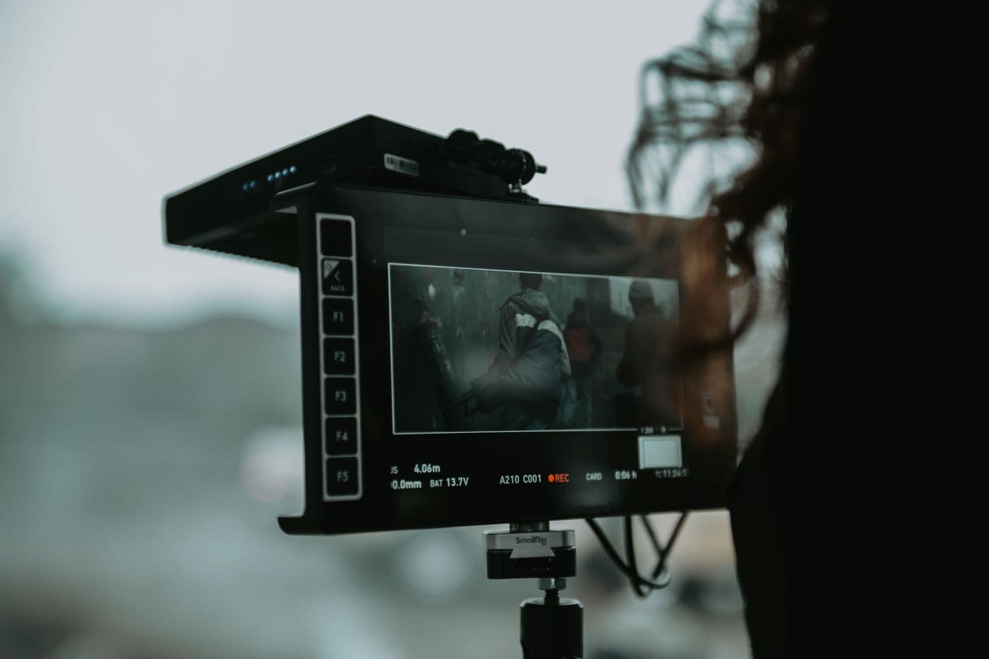 Professional camera and filming equipment set up outdoors during a shoot